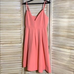 Knee length bright peach dress